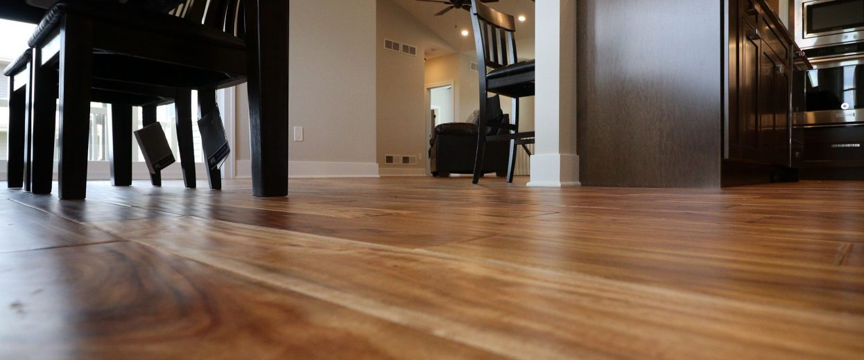 Brown hardwood flooring in dining room