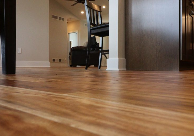 Brown hardwood flooring in dining room